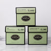 Three cartons of green tea.