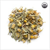 Circular pile of chamomile buds, lemongrass and lavender.
