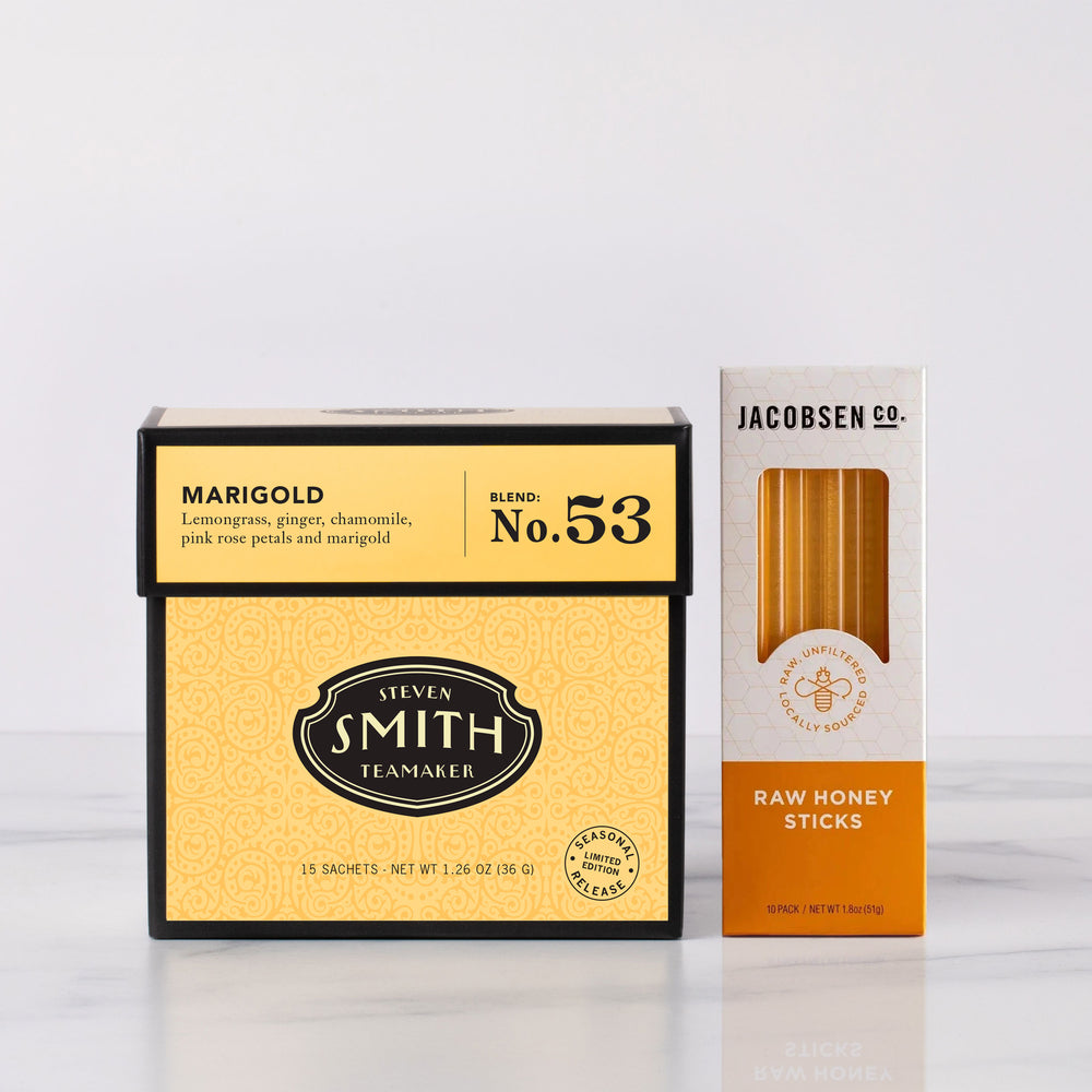 Two product boxes, one for Steven Smith tea and the other for Jacobsen Co. honey sticks, on a light gray background.