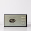 Dark silver box with black trim on marble background.
