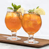Two snifter glasses branded with Smith logo on marble background.